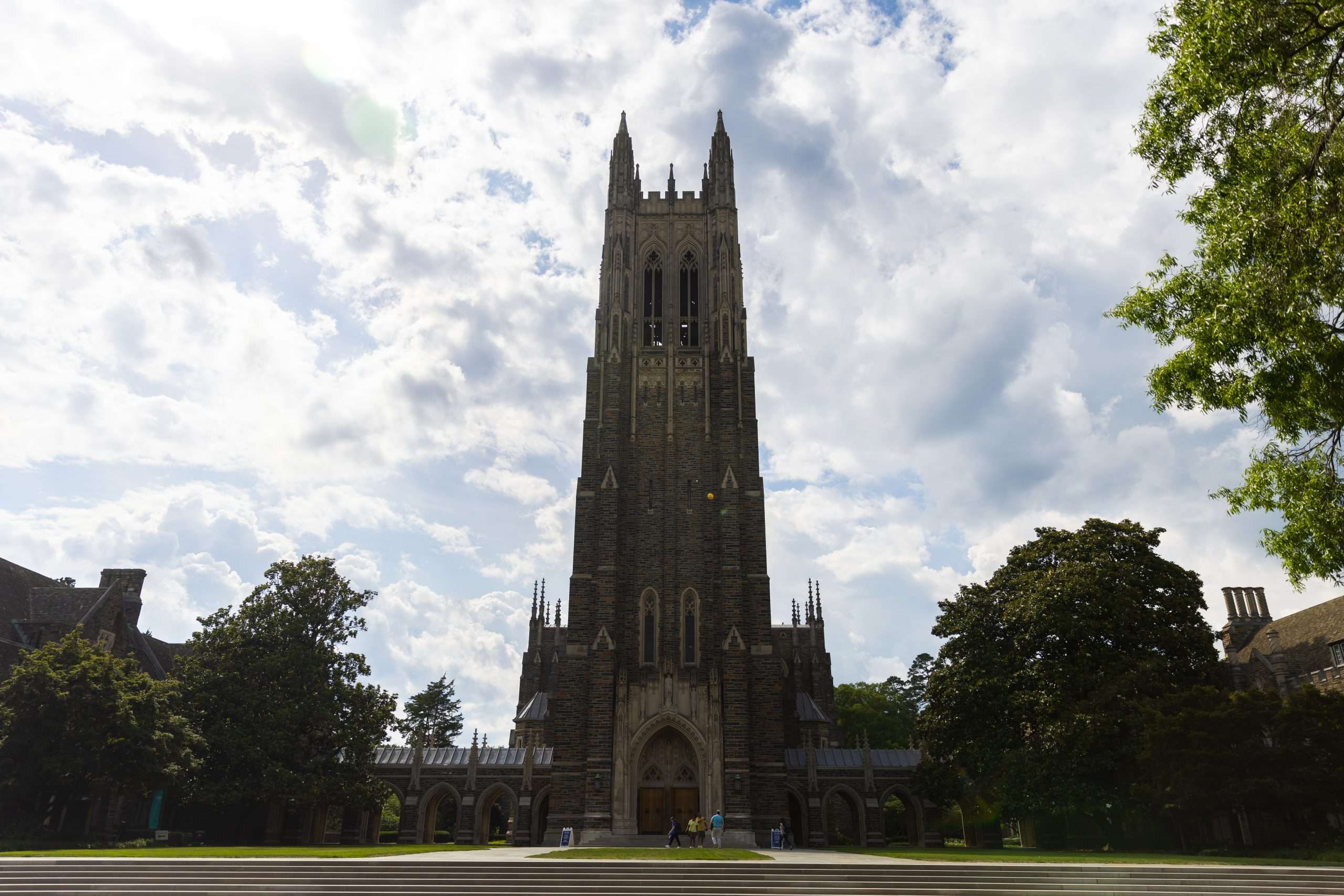 A view of Duke Chapel beyond a lawn at Duke University.