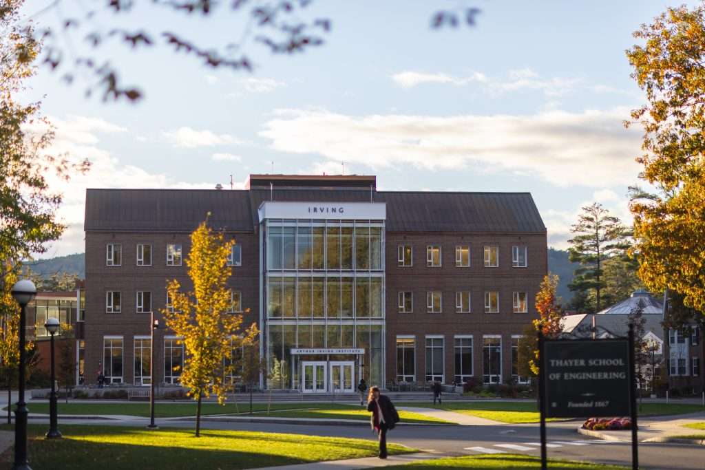 The Thayer School of Engineering’s Irving building is visible under a blue sky at Dartmouth College.
