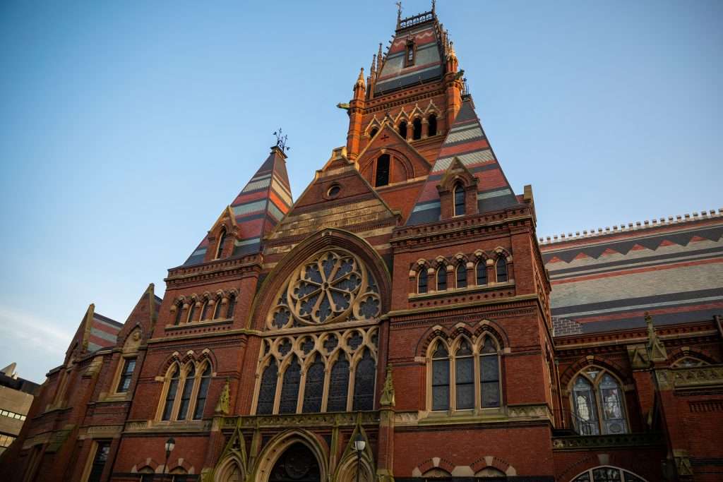 A gothic building is featured at Harvard University.